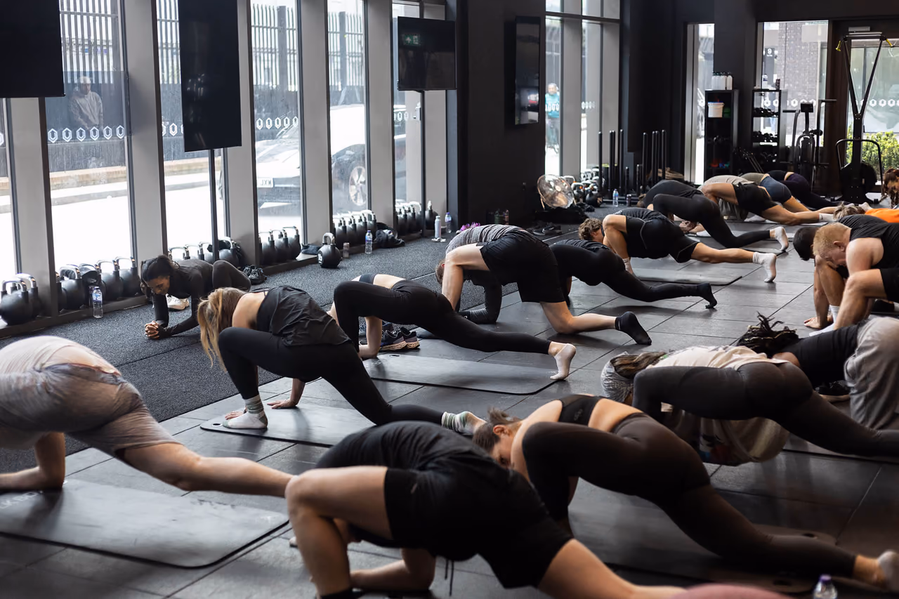 Participants moving through a floor mobility sequence
